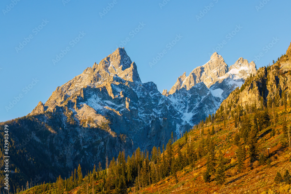 Cathedral Group mountains in Grand Teton National Park with snow during fall