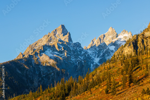 Cathedral Group mountains in Grand Teton National Park with snow during fall