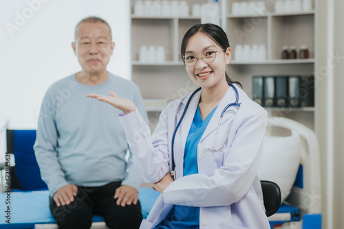 Female doctor talking taking care of her senior patient give support Doctor helping elderly patient with Alzheimer s disease A female attendant holds the hand of an elderly man