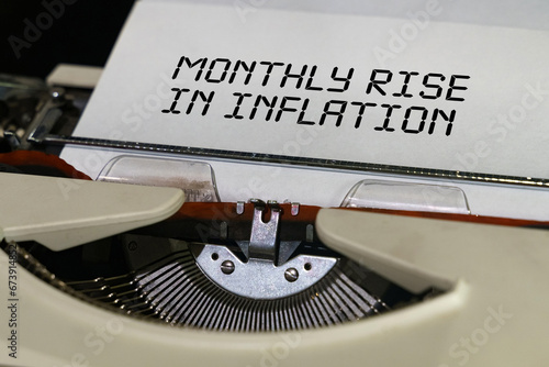 The text is printed on a typewriter - monthly rise in inflation