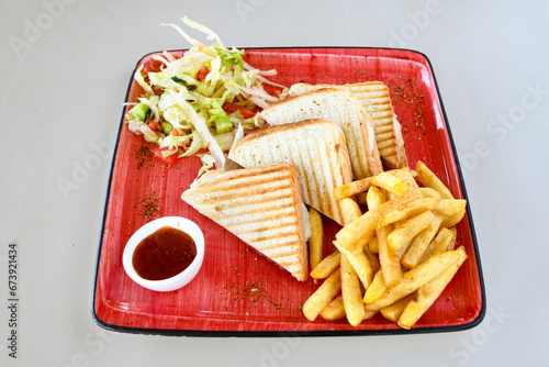 Turkish karisik atom Ayvalik tost ( kasarli bazlama tost) . Sucuklu, Kasarli, kavurmali karisik tost. Flat baked bread toasted. Karisik bazlama tost .   photo