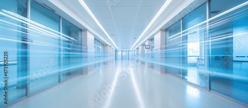 Modern hospital corridor and people with long exposure effect, blurred