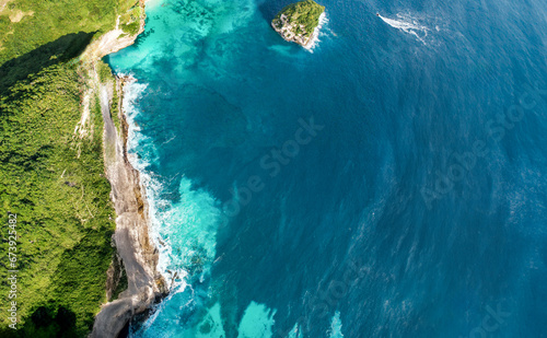 Aerial View of Green Mountain Beside the Ocean