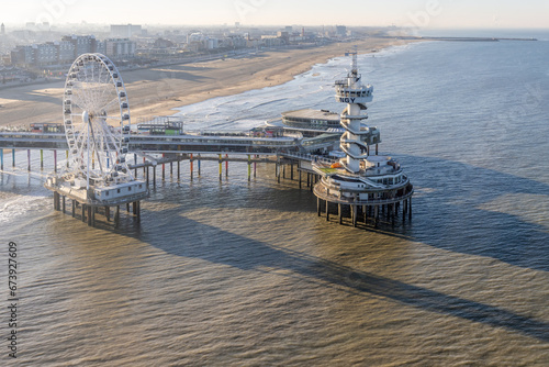 Aerial view Dutch pier Scheveningen with cityschape at The Hague photo