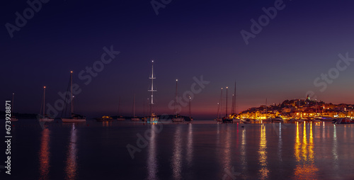sailing boat near Primosten at night 