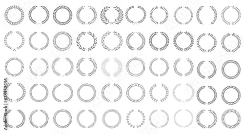 Set of one 50 and one silhouettes of laurel wreaths. Laurels wreaths frames branches decorative elements.