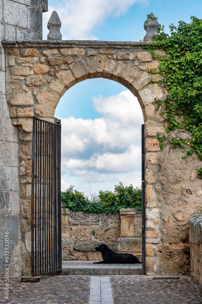 Stone arch in the wall surrounding the medieval town of Frias, Burgos, Spain. Stone arch in the wall surrounding the medieval town of Frias, Burgos, Spain.