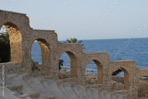 Ruins of the amphitheater on the Red Sea beach. Not far from Hurghada (Egypt). photo