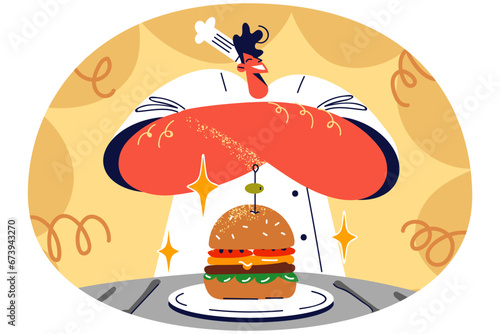 Proud male chef presenting burger