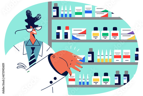 Smiling male pharmacist working in drugstore