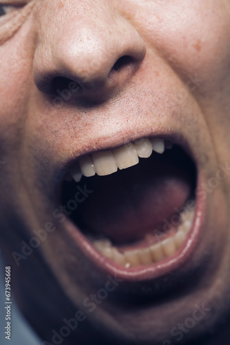 Man 50s mouth face lips closeup portrait