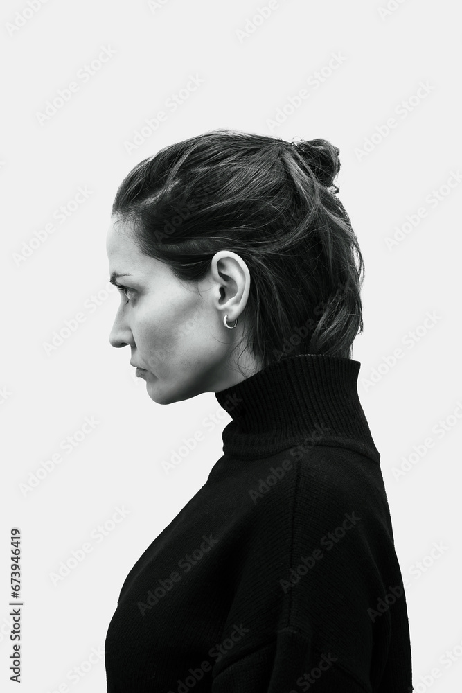 Black and white art studio portrait of a beautiful elegant woman in a black turtleneck. Elegant ballet style. Dramatic portrait of a young beautiful girl on a white background in the studio. Black and white art studio portrait of a beautiful elegant woman in a black turtleneck. Elegant ballet style. Dramatic portrait of a young beautiful girl on a white background in the studio.