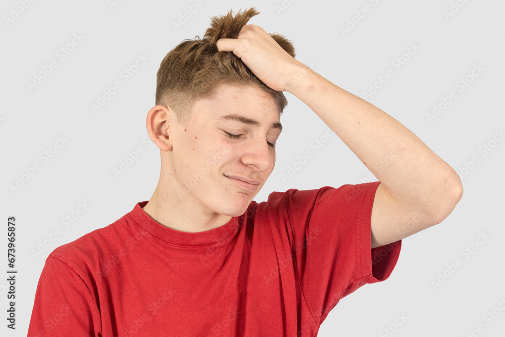 Headshot of an annoyed teenage boy Headshot of an annoyed teenage boy