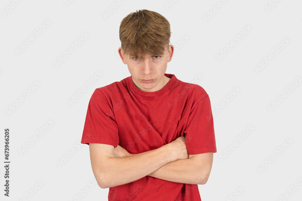 Headshot of an angry teenage boy Headshot of an angry teenage boy