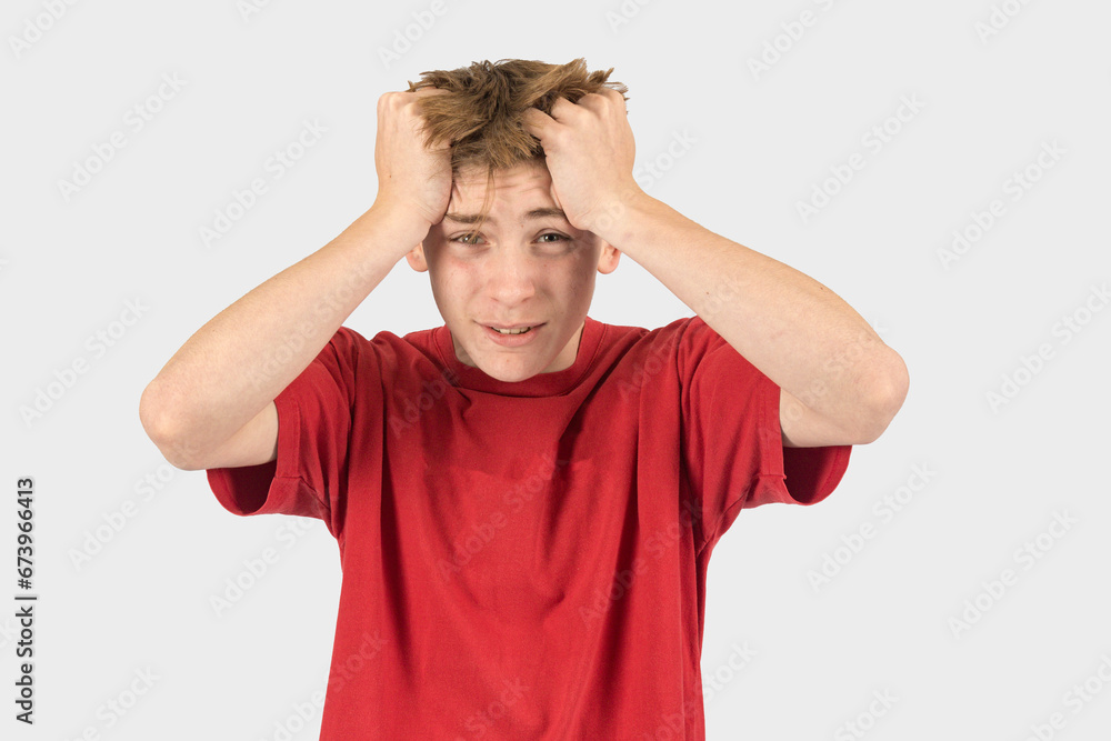 Headshot of a stressed teenage boy Headshot of a stressed teenage boy