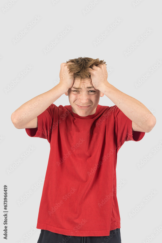 Headshot of a stressed teenage boy Headshot of a stressed teenage boy