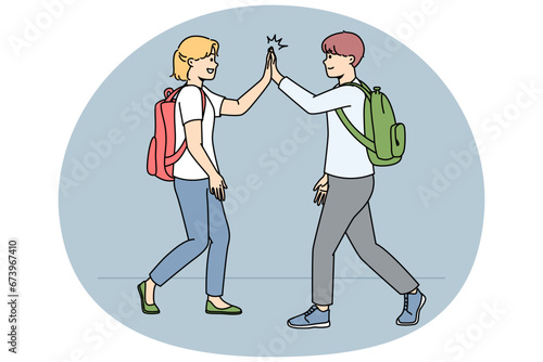 Smiling schoolchildren walking outdoors give high five. Happy friends greeting using non-verbal communication. Vector illustration.