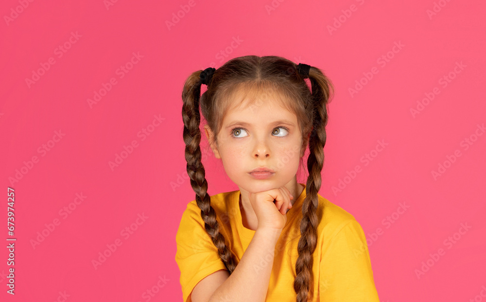 Pensive Little Girl Looking Aside At Copy Space And Touching Chin Pensive Little Girl Looking Aside At Copy Space And Touching Chin