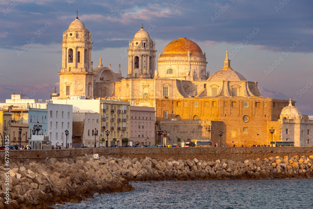 The building of the Cathedral of the Holy Cross in Cadiz at sunset. Spain. Andalusia.