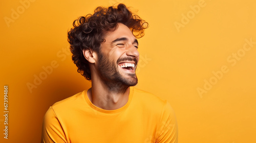 handsome young man with beard spreads good humour