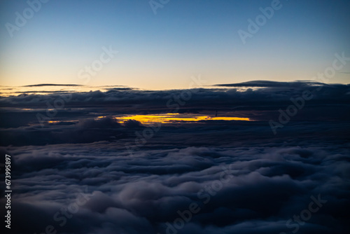 colorful sunset view from airplane © Norbert Faryna