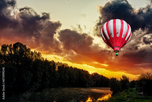 Paragliding with a parachute on the background of sunset.