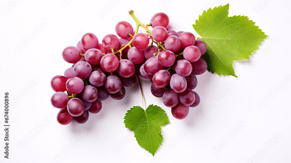 Fototapeta premium Isolated, top-view of halved red grape fruit with verdant foliage on a white backdrop.