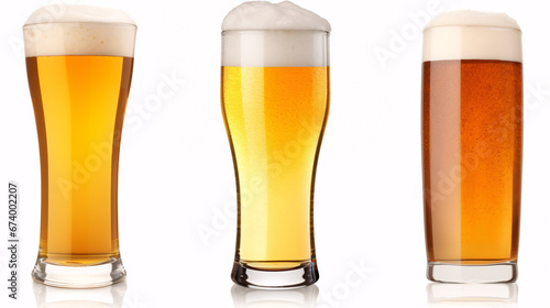 Three cold mugs of varied beer isolated on a white backdrop.