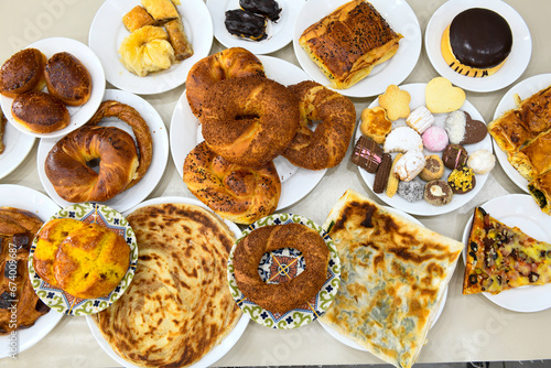 Table scene of assorted take out or delivery foods. Traditional Turkish cuisine. Various Turkish meal and appetizers. Top down view on a table. photo