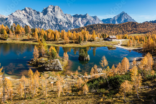 Autumn scenery at lake Federa in Dolomites mountains. photo