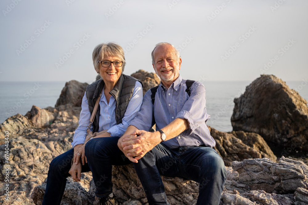 Happy senior couple on mediterranean coast