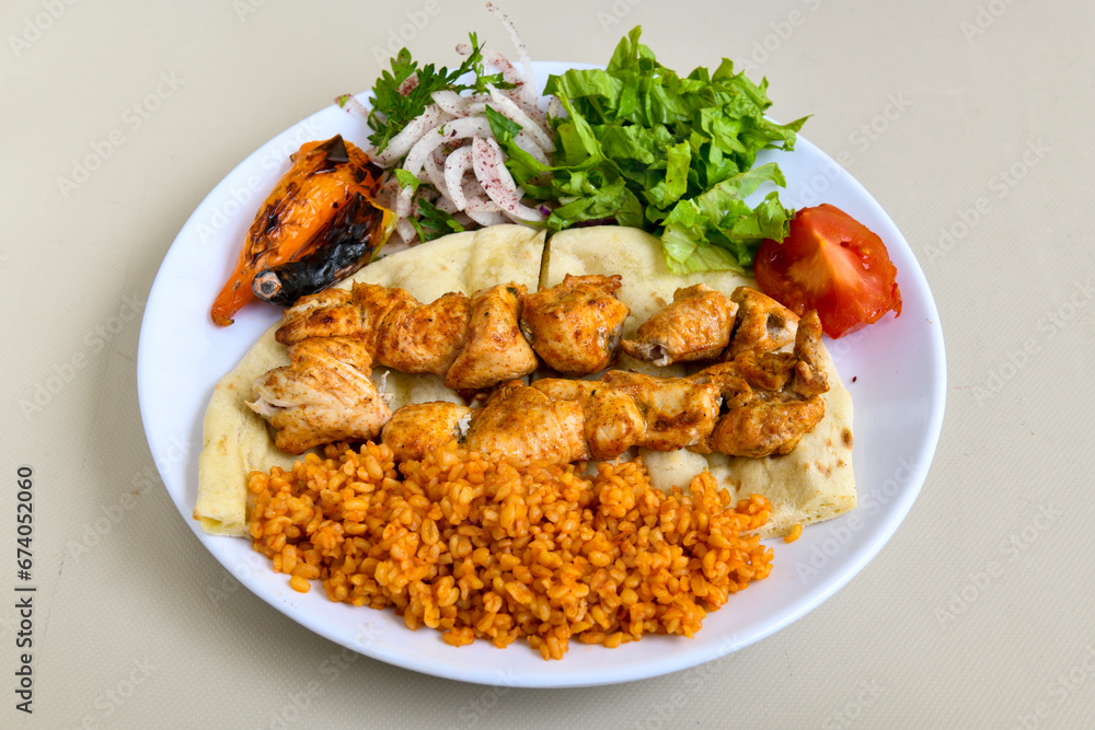 Chicken wings barbeque in a dish with BBQ grill sauce . Izgara tavuk kelebek sis kanat. Tavuk sis, gogus. Chicken wings barbeque in a dish with BBQ grill sauce . Izgara tavuk kelebek sis kanat. Tavuk sis, gogus.