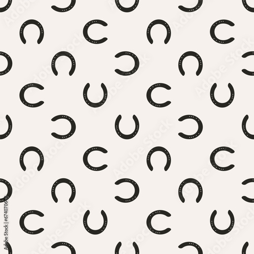 Simple modern vector pattern with horseshoes