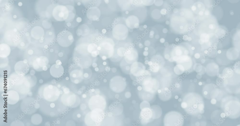 Blurred white blue winter bokeh loop slow motion background. Concept Christmas and New Year decoration. Blurred white blue winter bokeh loop slow motion background. Concept Christmas and New Year decoration.