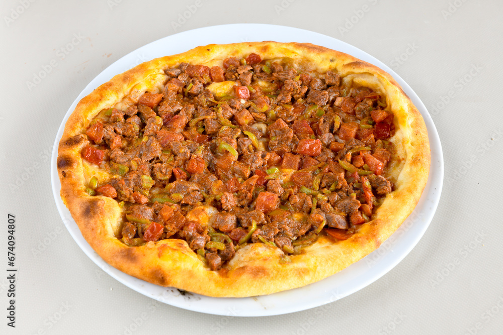 Kiymali pide.Turkish pide with minced meat. Turkish pizza mince pita Pide on white background. Etli ekmek. Kusbasi kasarli, kiymali kasarli, kiymali yumurtali, tirnak Trabzon, Bafra, Kusbasili pide. Kiymali pide.Turkish pide with minced meat. Turkish pizza mince pita Pide on white background. Etli ekmek. Kusbasi kasarli, kiymali kasarli, kiymali yumurtali, tirnak Trabzon, Bafra, Kusbasili pide.