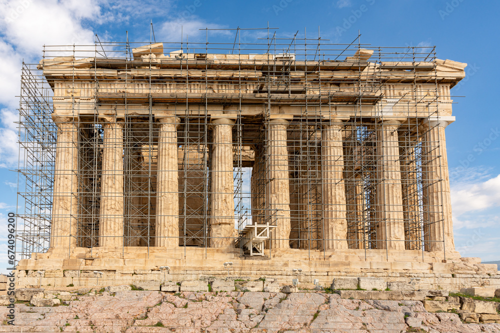 Fototapeta premium The facade of the Temple of Parthenon in Acropolis Athens hill, Greece - ancient temple with colonnade 