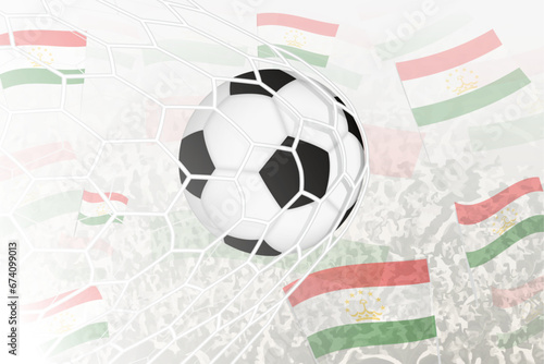 National Football team of Tajikistan scored goal. Ball in goal net, while football supporters are waving the Tajikistan flag in the background.