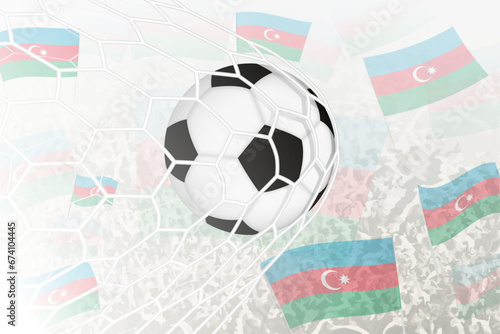 National Football team of Azerbaijan scored goal. Ball in goal net, while football supporters are waving the Azerbaijan flag in the background.