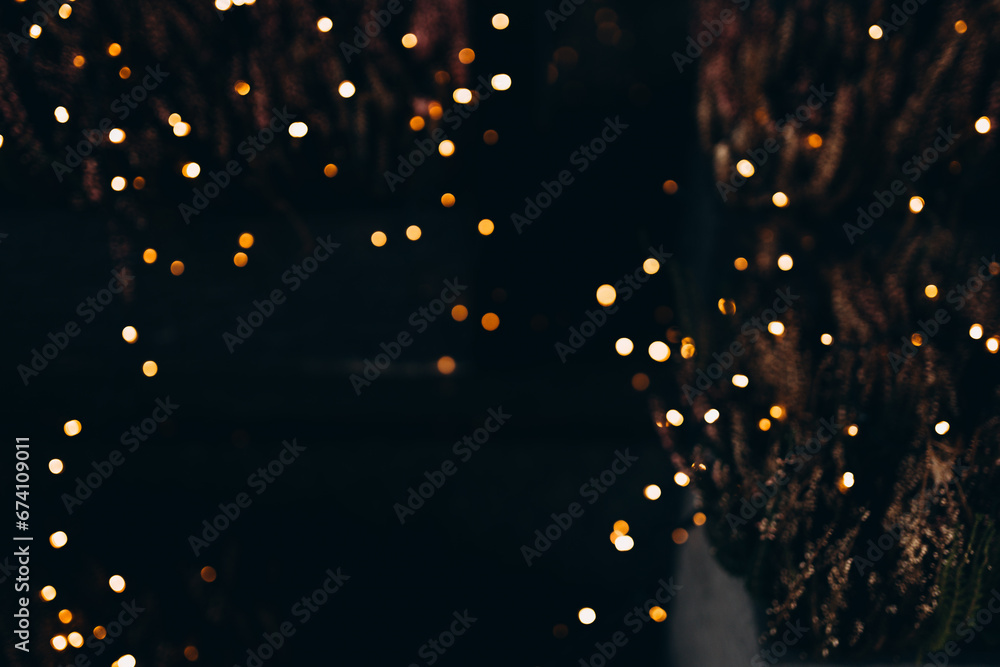 Decorative string lights at night time, Defocused Background, night city backdrop, party time with Yellow bokeh balls. - obrazy, fototapety, plakaty 