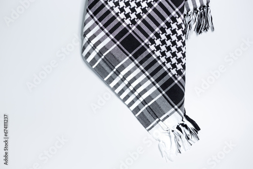 Keffiyeh, hatah, hijab, kandura or pushi, head covering commonly used in the Middle East and the Arab World. Keffiyeh is a traditional garment tied to the head. photo