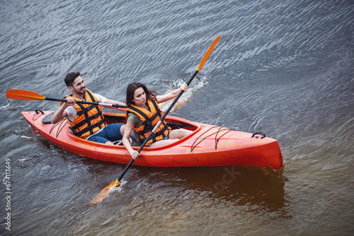 Couple travelling by kayak © georgerudy