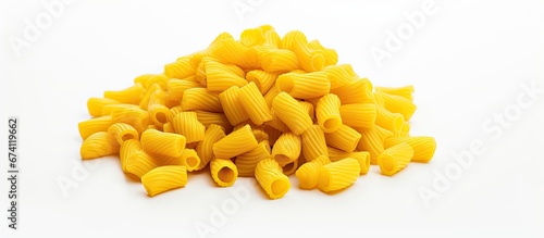 On a white surface separate a group of yellow macaroni