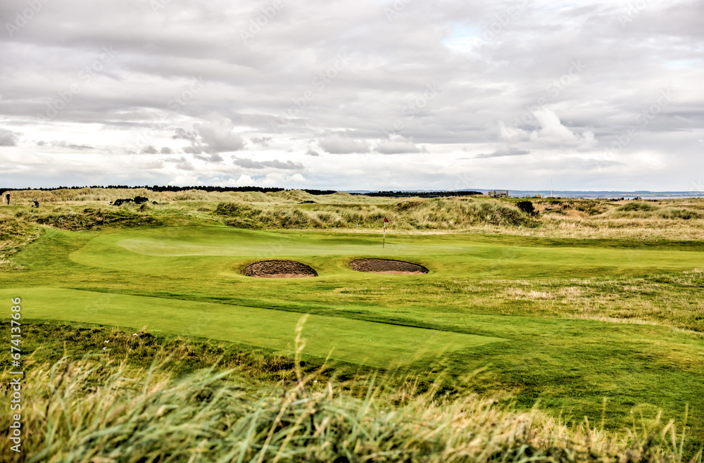 Obraz premium St Andrews, Scotland - September 22, 2023: Landscape views of the Jubilee Golf Course, a public course in St Andrews Scotland 