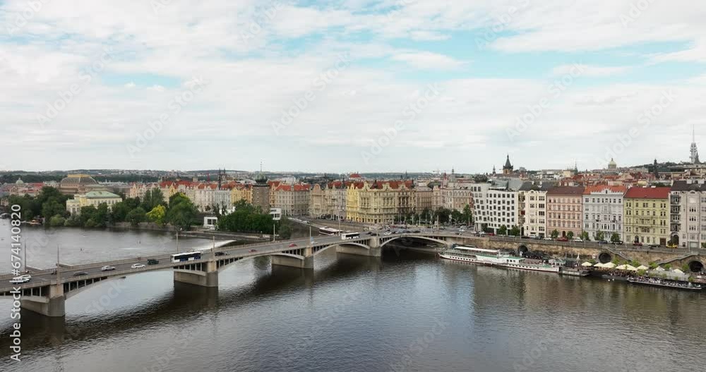 Prague scenic aerial view of old town architecture. Vltava river, bridges in Prague, Czech Republic. Prague panoramic aerial drone view above Prague with church and old european building. Prague scenic aerial view of old town architecture. Vltava river, bridges in Prague, Czech Republic. Prague panoramic aerial drone view above Prague with church and old european building.