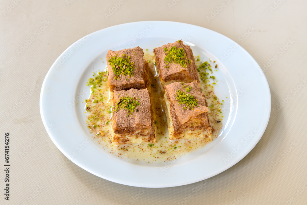 Turkish Dessert Sobiyet  Baklava, mussels baklava and classic baklava with Pistachio . Cevizli, Fistikli Baklava, top view.