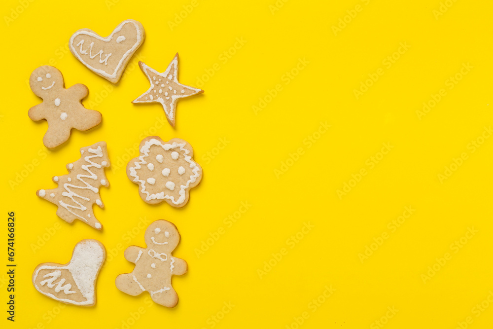 Cute homemade Christmas cookies on color background,top view Cute homemade Christmas cookies on color background,top view