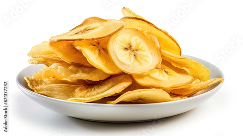 Banana chips in a plate on a white background photo