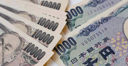 Japanese banknote 10,000 with 1,000 yen. Japanese money photo
