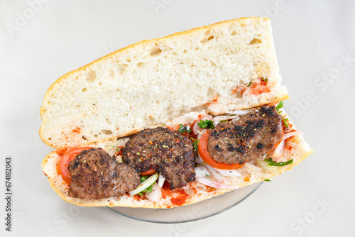 Meatball between bread (Turkish name : ekmek arasi kofte ). Izgara kofte