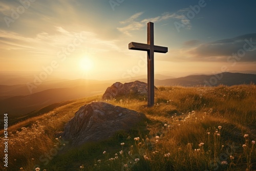 Sunrise outdoors Christian cross on hill signifies Jesus resurrection photo